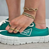 Emerald and Diamond bypass ring - Lexie Jordan Jewelry